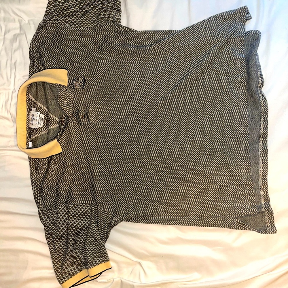 Vintage collared polo. Size large but fits like a medium.